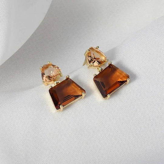 Pendientes de cristal del desierto en oro.