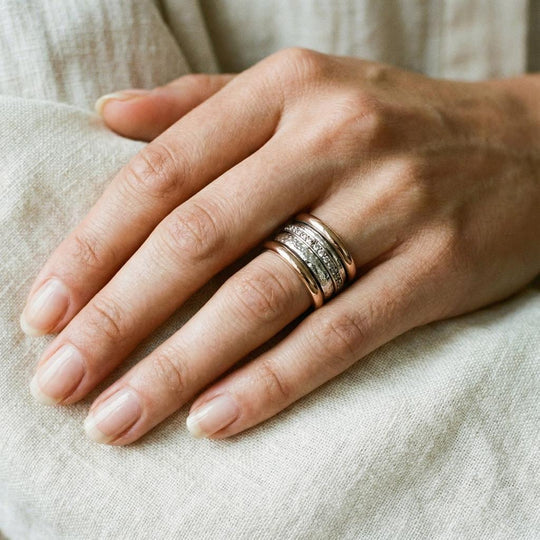 Gold Ring with Rows of cubic Zirconia.