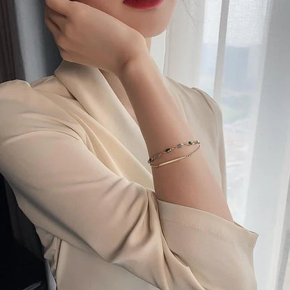 Pulsera con doble colgante