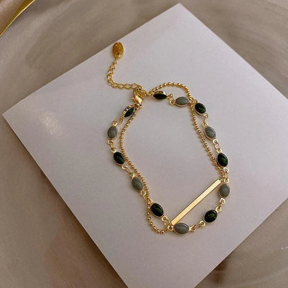 Pulsera con doble colgante