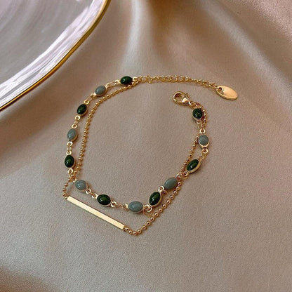 Pulsera con doble colgante