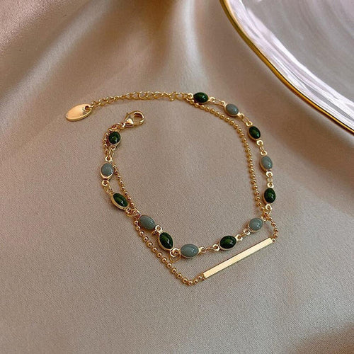 Pulsera con doble colgante