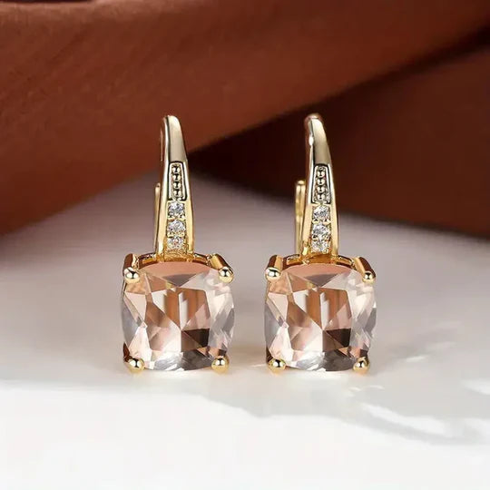 Gold hoop Earrings with mystery Stones.