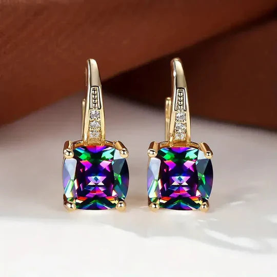 Gold hoop Earrings with mystery Stones.