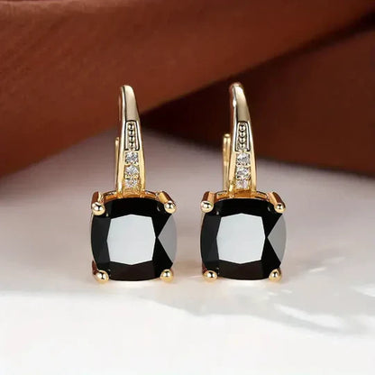 Gold hoop Earrings with mystery Stones.
