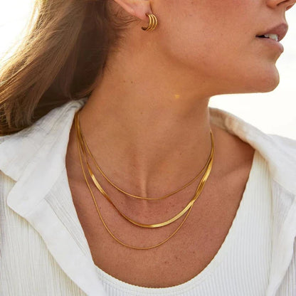 Multilayered gold chain necklace