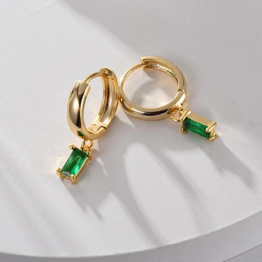 Elegant Louise earrings with emeralds.