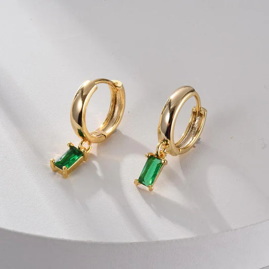 Elegant Louise earrings with emeralds.