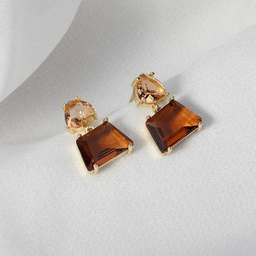 Pendientes de cristal del desierto en oro.