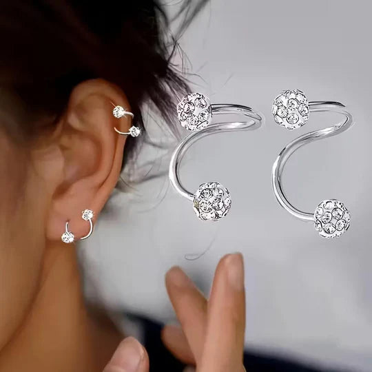 Set of lightweight and luxurious earrings with spiral beads and rhinestones.